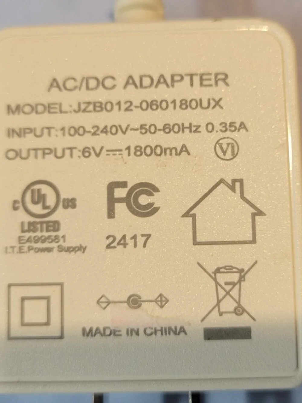 AC/DC Adapter Model JZB012-060180UX 6V 1800mA